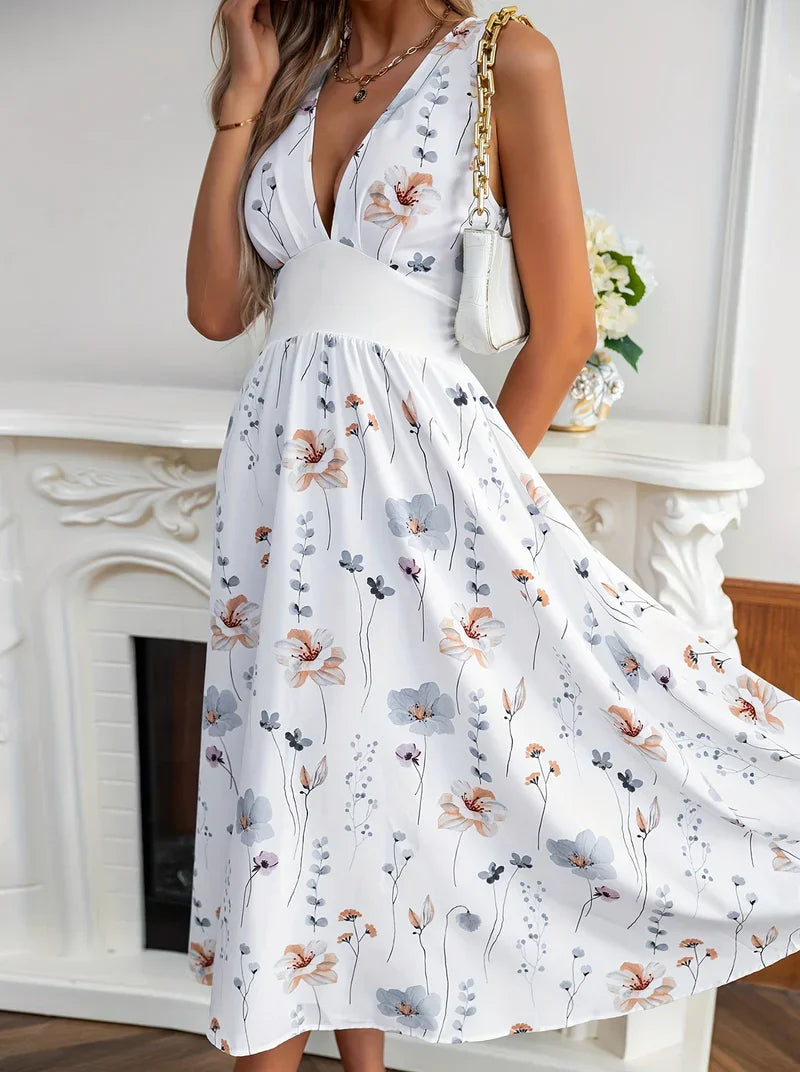 Lola - Robe midi élégante avec imprimé floral, décolleté profond en V et taille haute